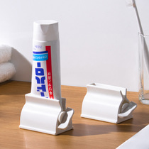 日本牙膏挤压器儿童手动懒人挤牙膏神器洗面奶小样卷压夹子置物架