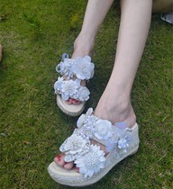 欧洲站夏季新品坡跟女士真皮凉拖 原创设计花朵甜美草编鱼嘴凉鞋